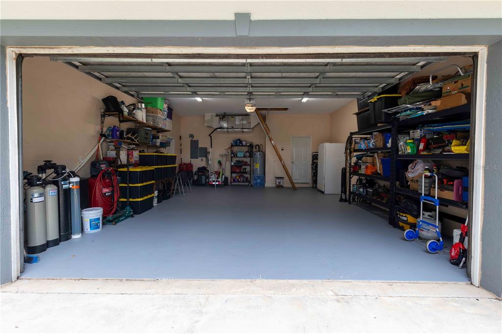 2329 South Lake Reedy Boulevard Frostproof, FL 33843 - Photo 67 of 86 a view of a storage room with a lot of stuff
