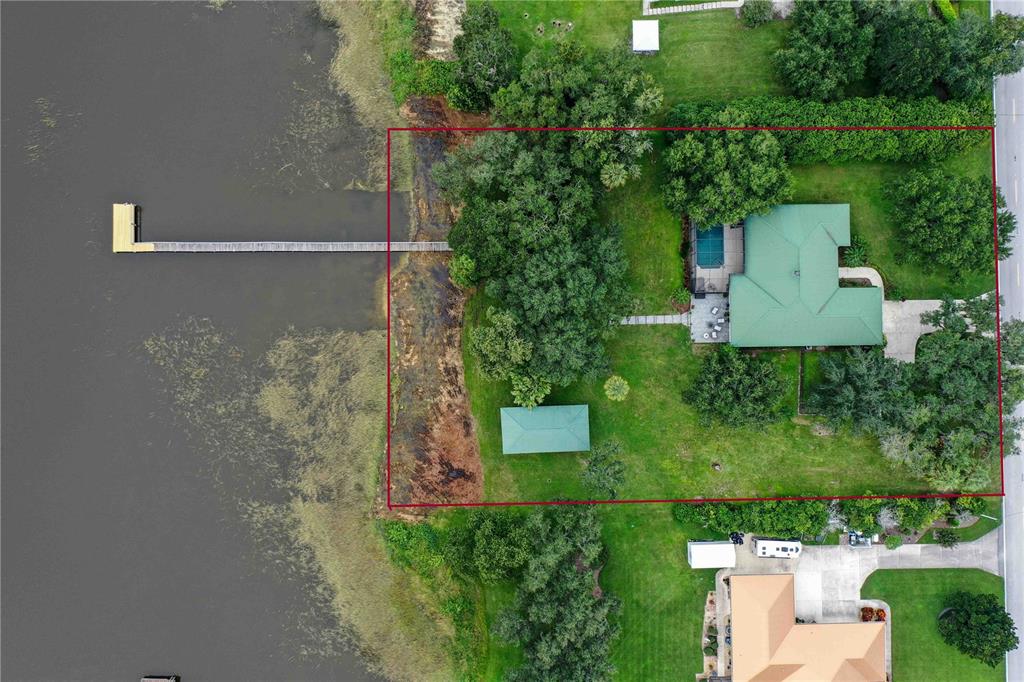 2329 South Lake Reedy Boulevard Frostproof, FL 33843 - Photo 8 of 86 an aerial view of a house with a yard