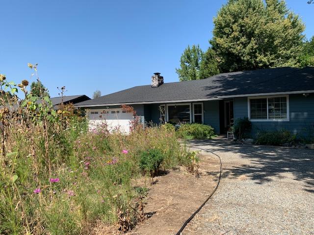 2125 Spring Street Medford, OR 97504 - Photo 3 of 28 Front of House with flowers