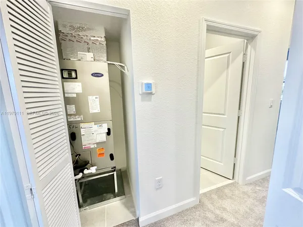 view of living room with washer and dryer