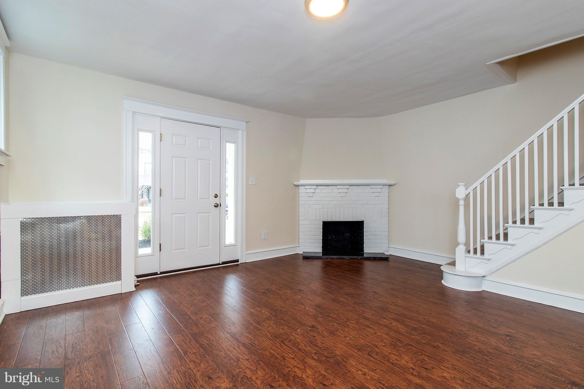 630 Arbor Road Cheltenham, PA 19012 - Photo 2 of 24 Living Room with Wood burning Fireplace