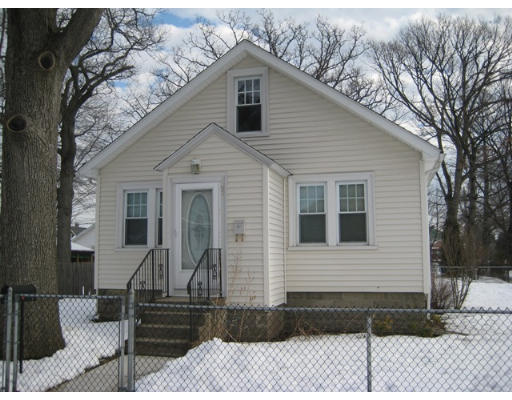 91 Fresno Street Springfield, MA 01104 - Photo 1 of 18 a front view of a house with garden