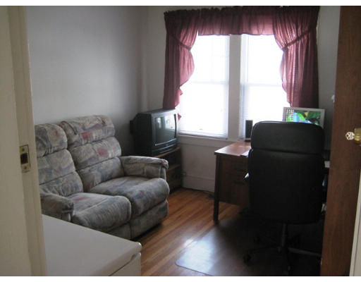 91 Fresno Street Springfield, MA 01104 - Photo 15 of 18 a living room with furniture and a window