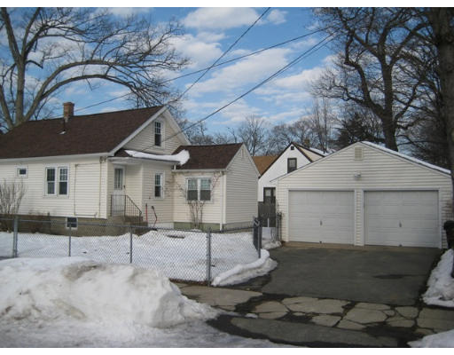 91 Fresno Street Springfield, MA 01104 - Photo 4 of 18 a view of a house with a patio