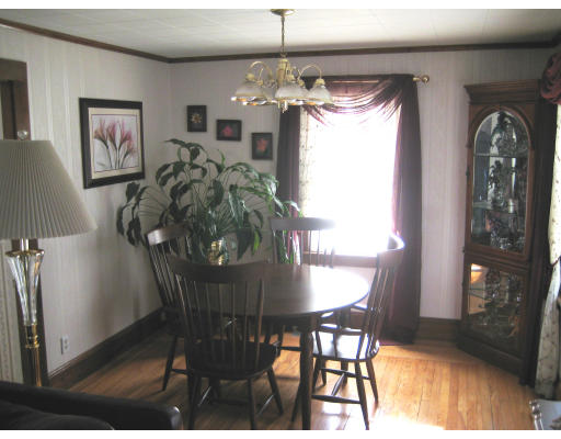 91 Fresno Street Springfield, MA 01104 - Photo 6 of 18 a view of a dining room with furniture and chandelier