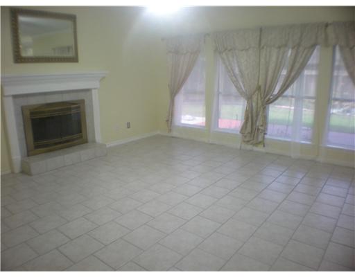 5113 Kings Court Corpus Christi, TX 78413 - Photo 4 of 10 a view of empty room with a fireplace