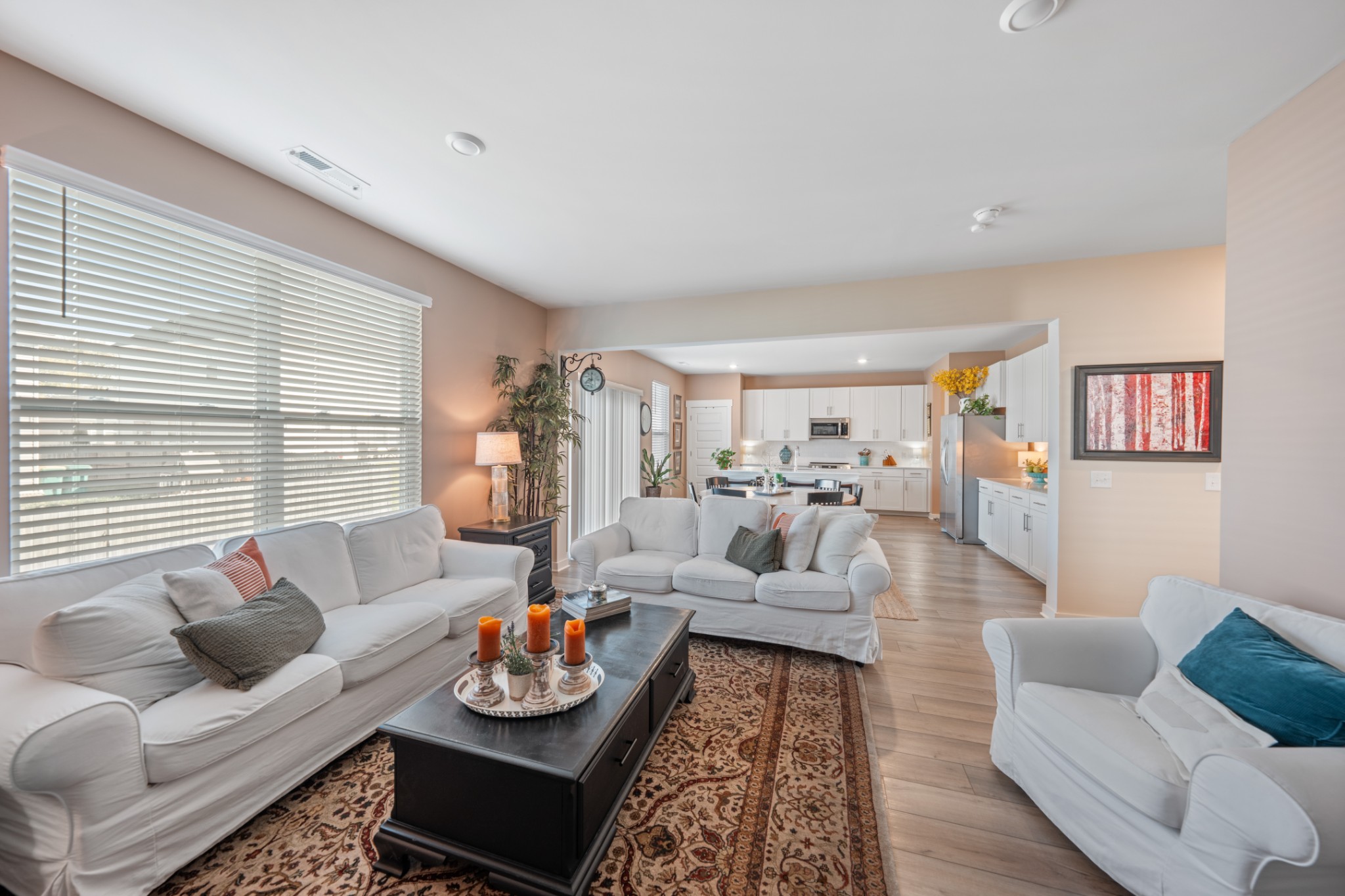158 Southwind Run Spring Hill, TN 37174 - Photo 13 of 43 a living room with furniture and a wooden floor