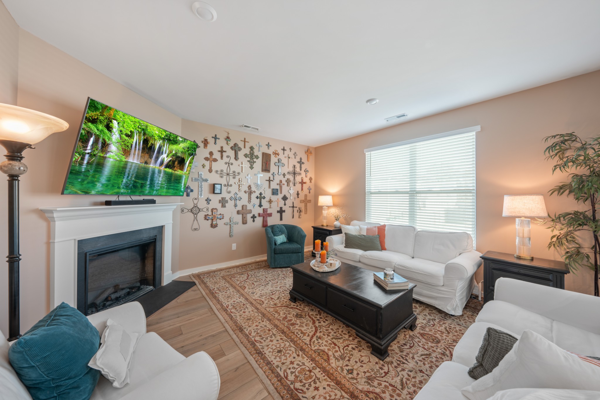 158 Southwind Run Spring Hill, TN 37174 - Photo 20 of 43 a living room with furniture a large window and a fireplace