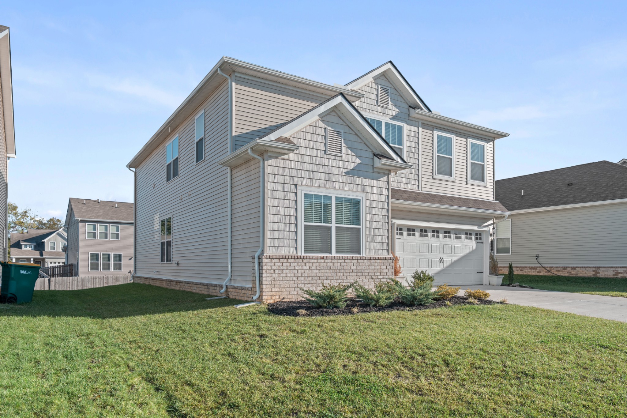 158 Southwind Run Spring Hill, TN 37174 - Photo 2 of 43 a front view of a house with a yard