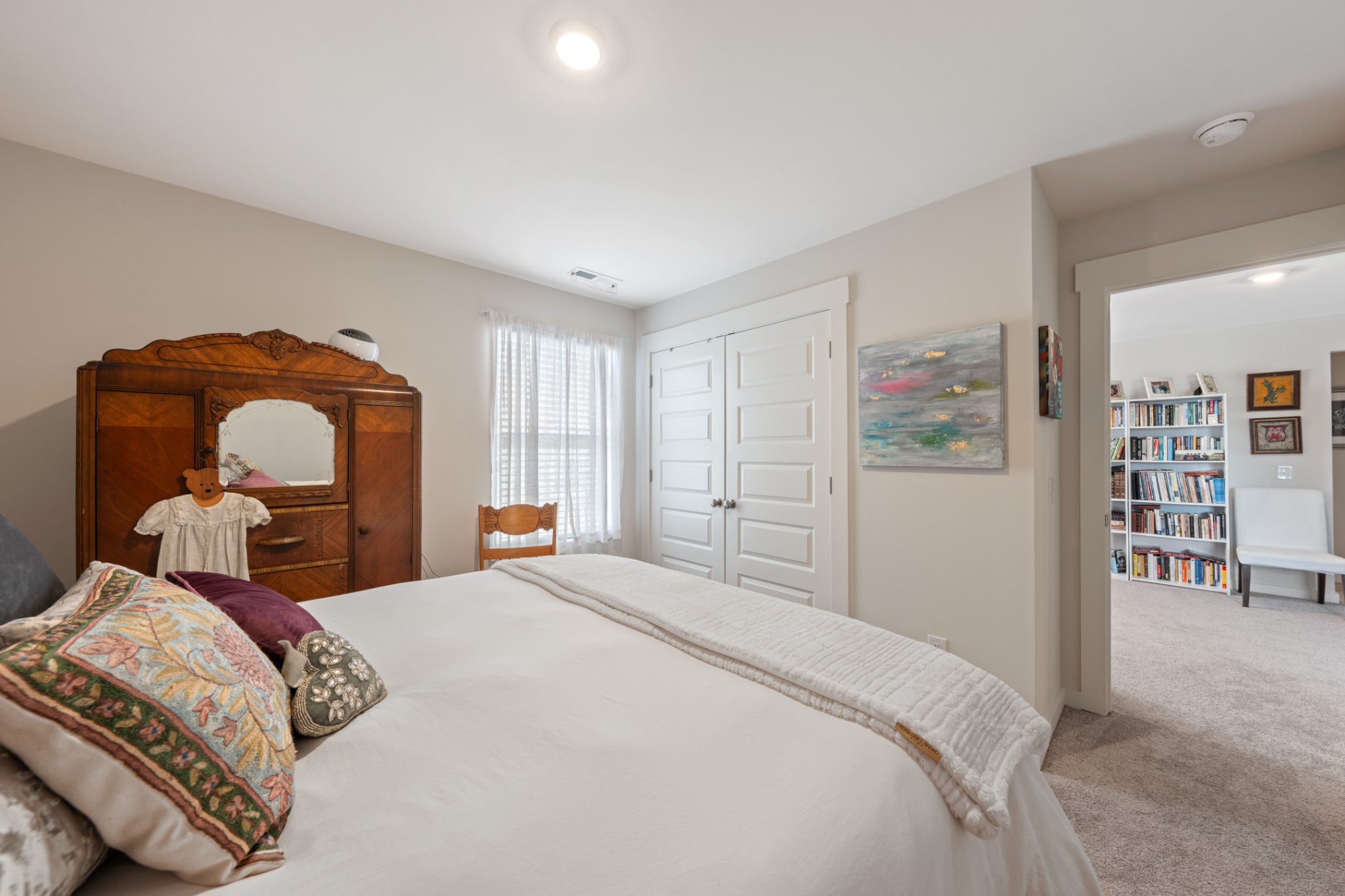 158 Southwind Run Spring Hill, TN 37174 - Photo 25 of 43 a bedroom with a bed and a large mirror