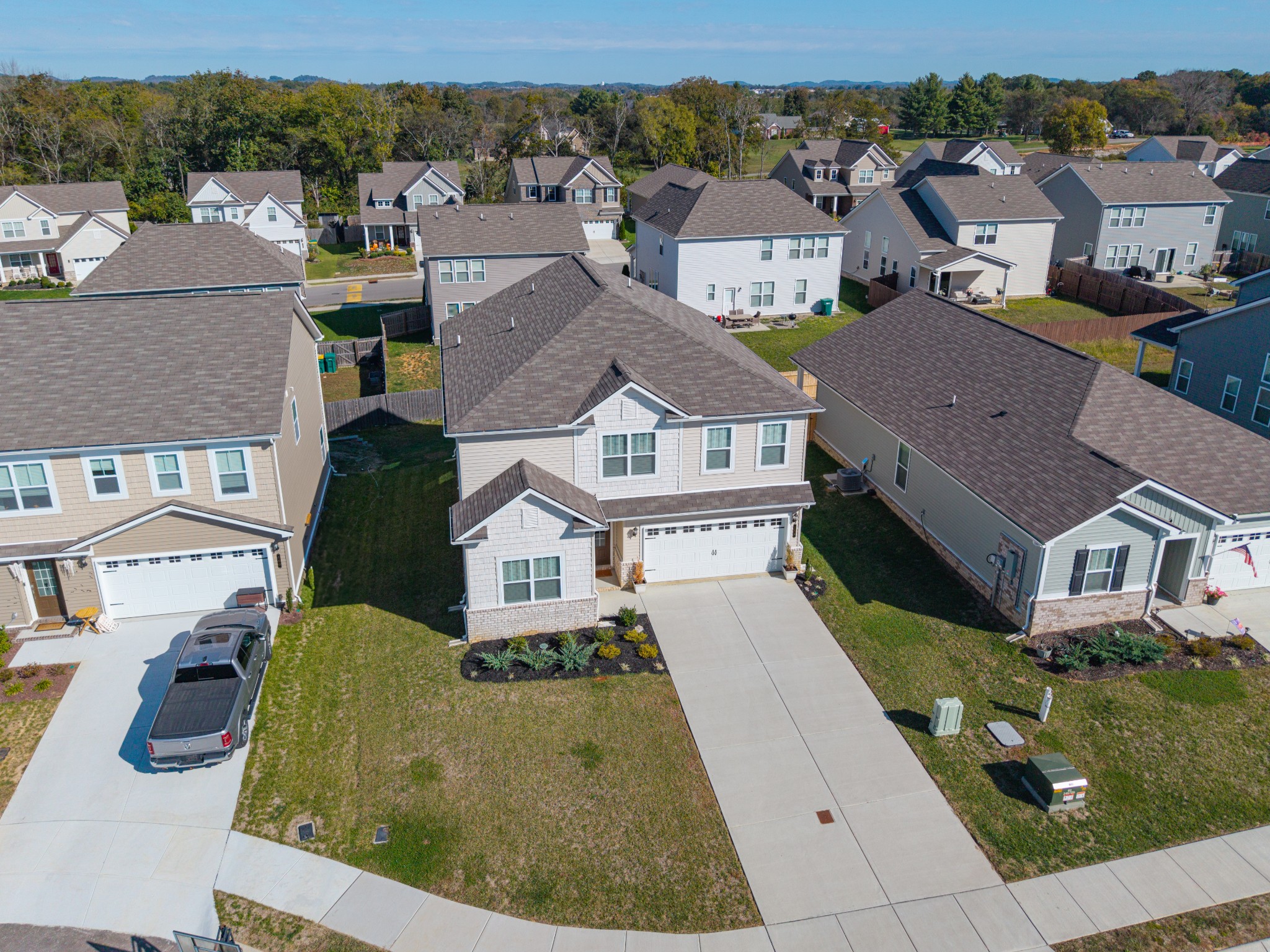 158 Southwind Run Spring Hill, TN 37174 - Photo 35 of 43 an aerial view of multiple houses with a yard
