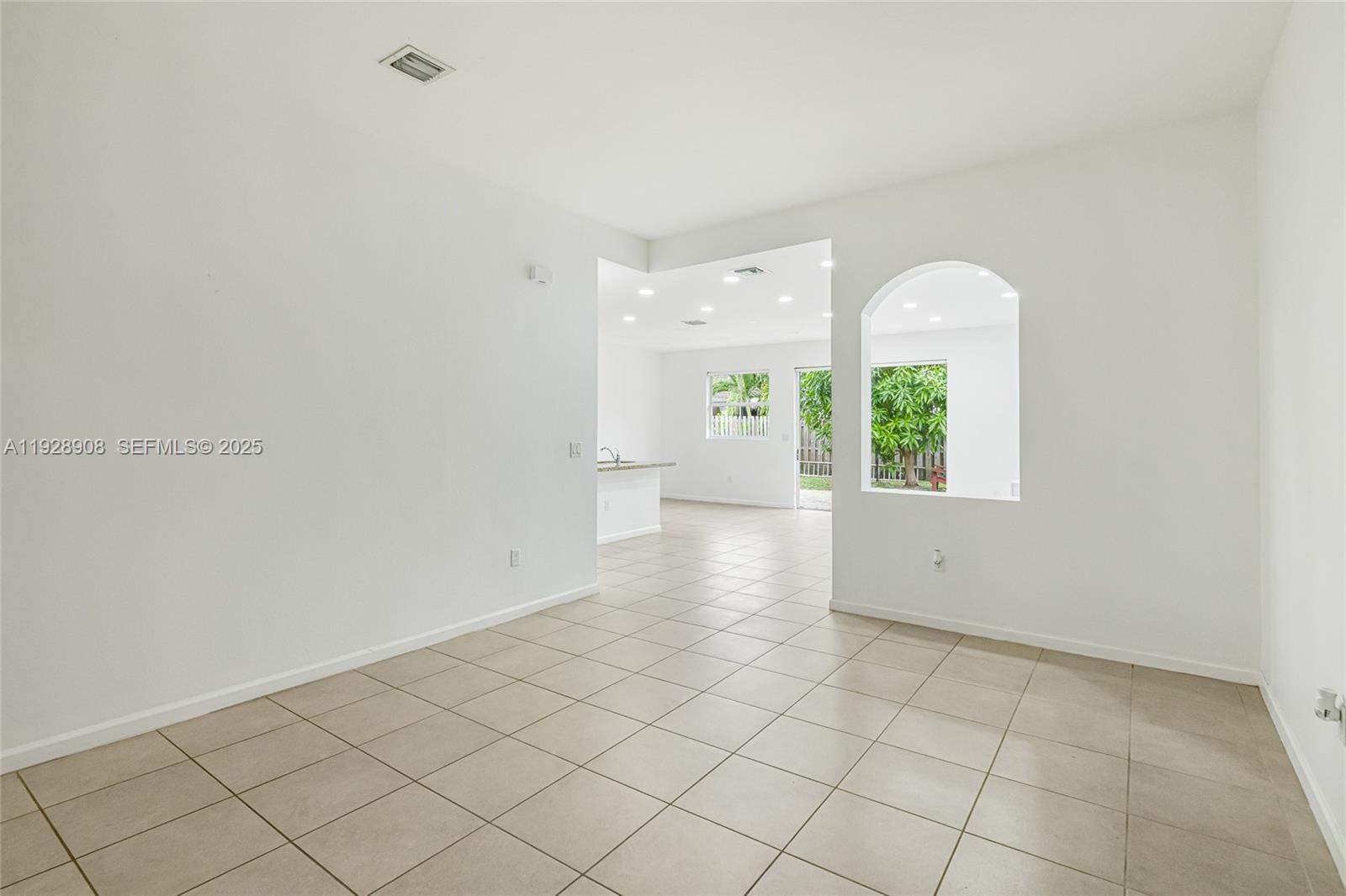 11863 Southwest 253rd Terrace Homestead, FL 33032 - Photo 17 of 30 an empty room with windows