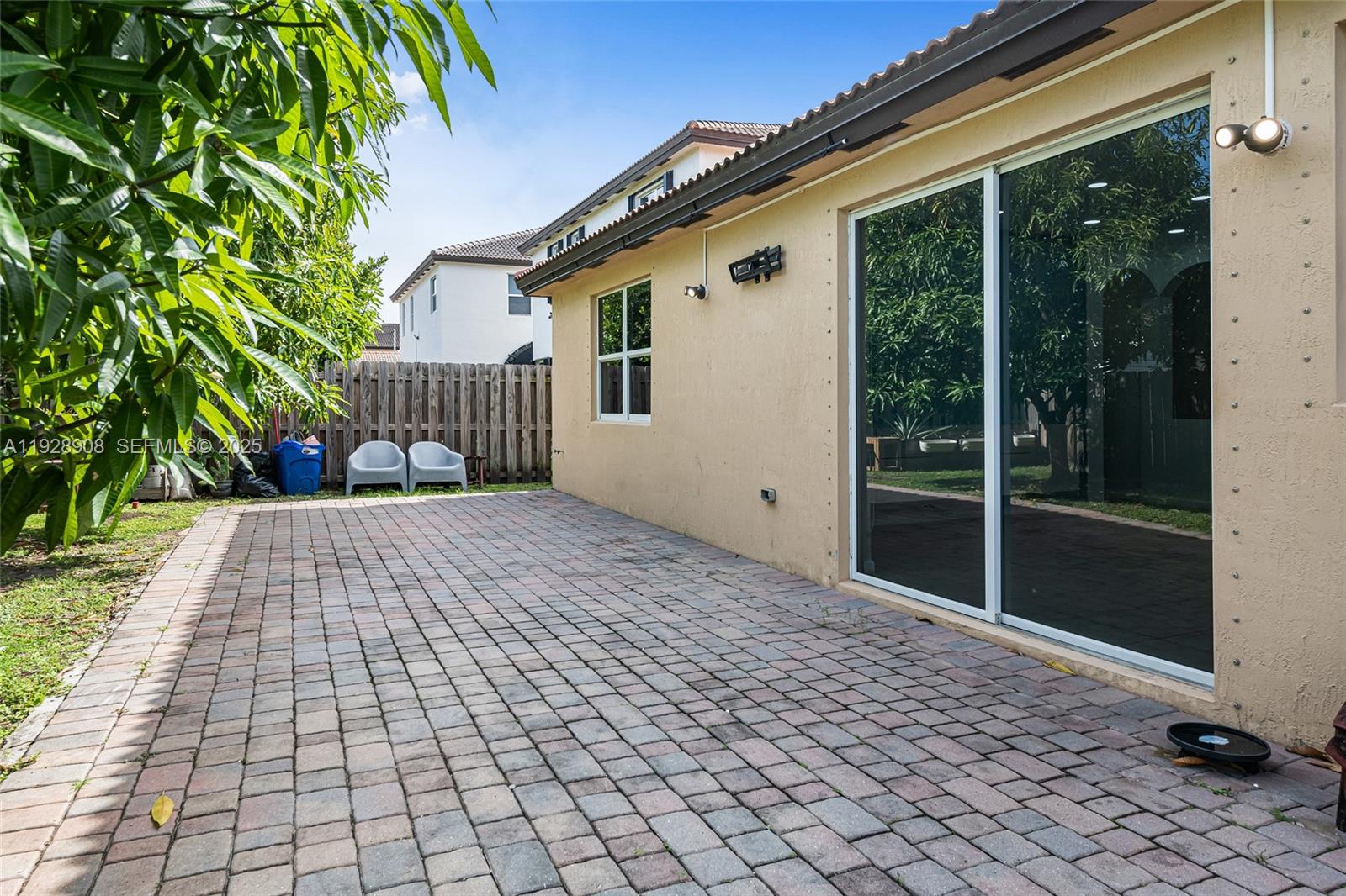 11863 Southwest 253rd Terrace Homestead, FL 33032 - Photo 27 of 30 a front view of a house with a yard