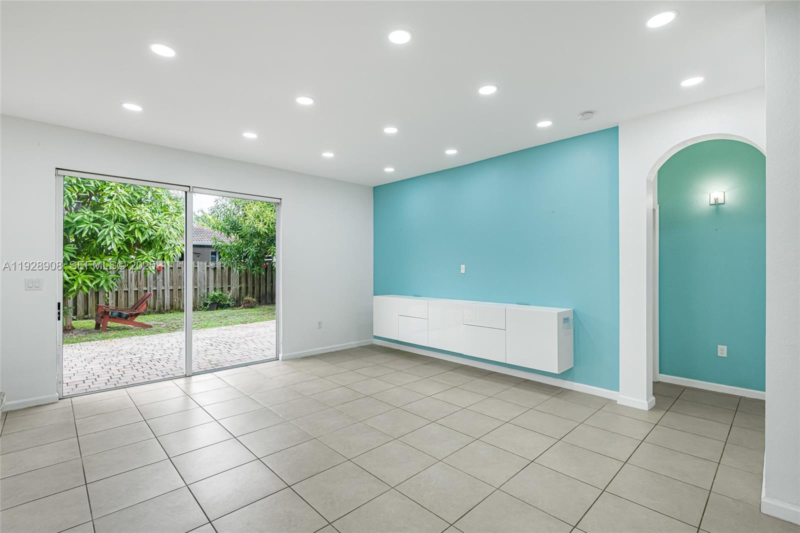 11863 Southwest 253rd Terrace Homestead, FL 33032 - Photo 7 of 30 a view of an empty room with a window