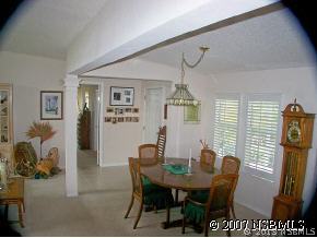 403 Portside Lane Edgewater, FL 32141 - Photo 10 of 12 a view of a dining room with furniture