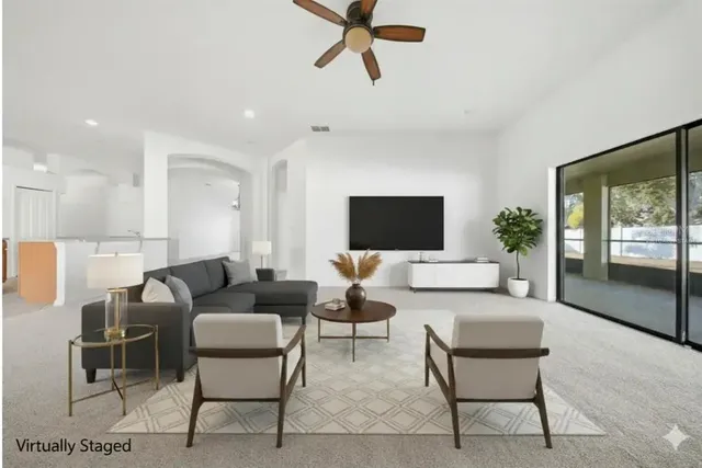a spacious bathroom with a double vanity sink mirror and shower