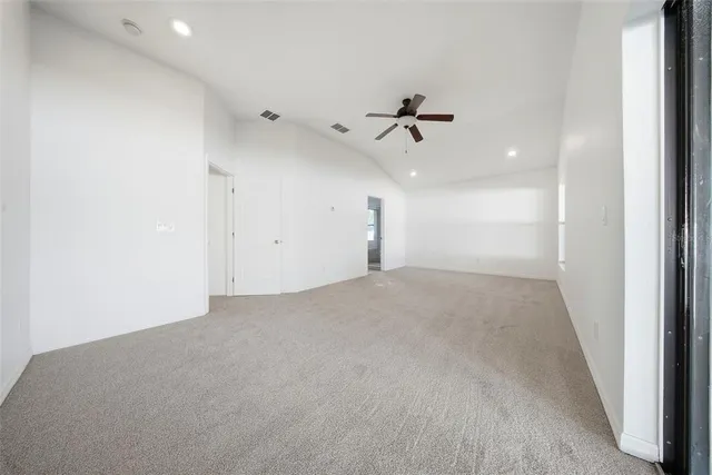 front view of a house with a garden