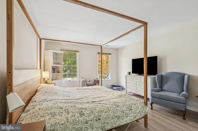 a view of living room with furniture and floor to ceiling window
