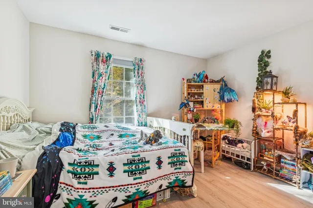 a view of balcony with wooden floor and outdoor seating