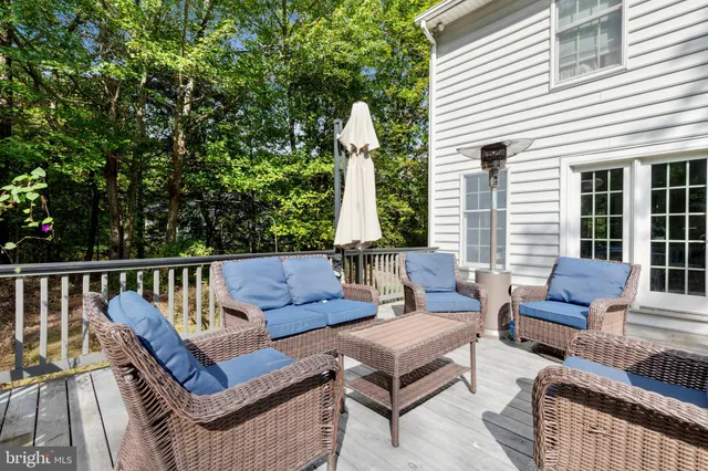 a view of a house with a yard and garage