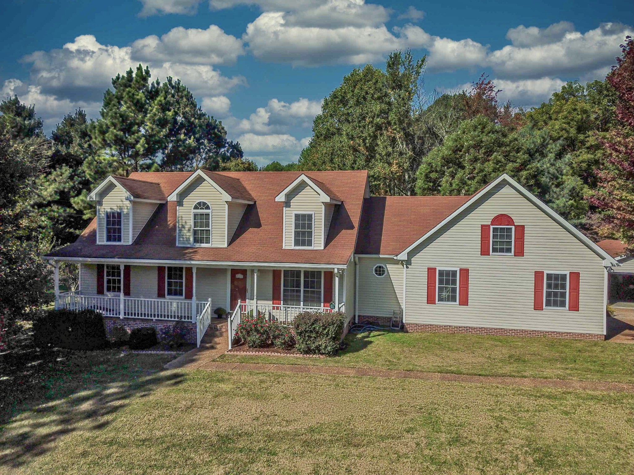 1059 North Corinth Road Portland, TN 37148 - Photo 1 of 40 a view of a big house with a big yard and potted plants