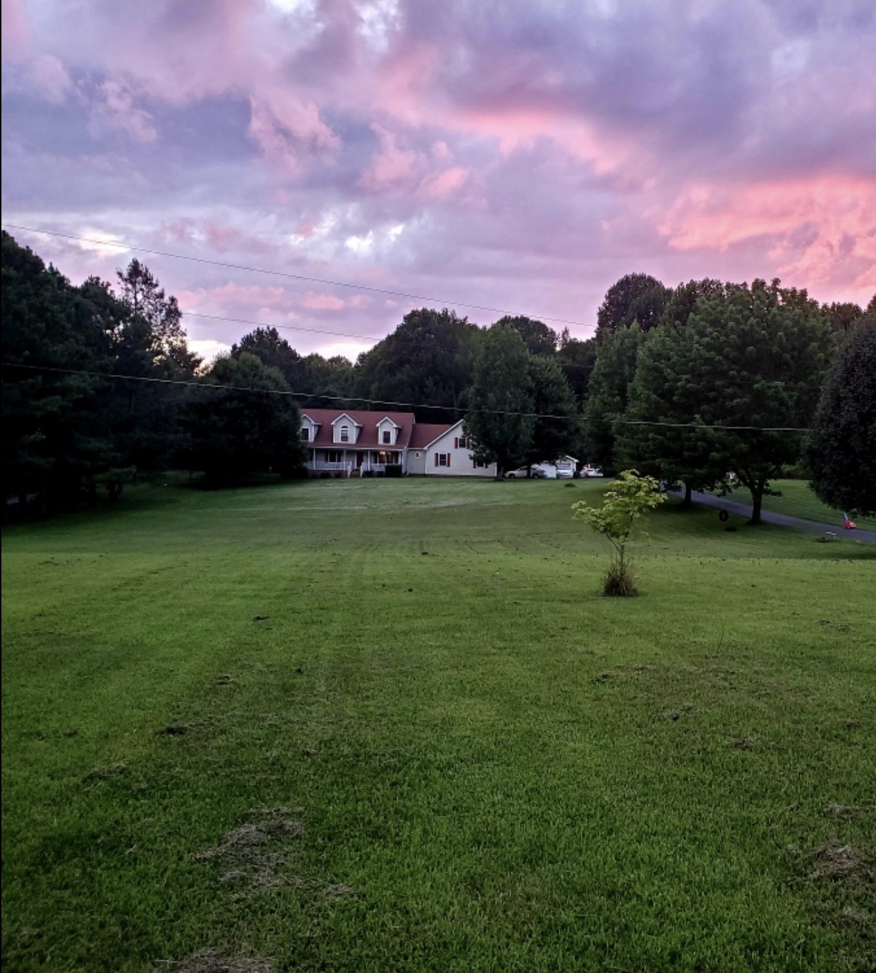1059 North Corinth Road Portland, TN 37148 - Photo 2 of 40 a backyard of a house with lots of green space