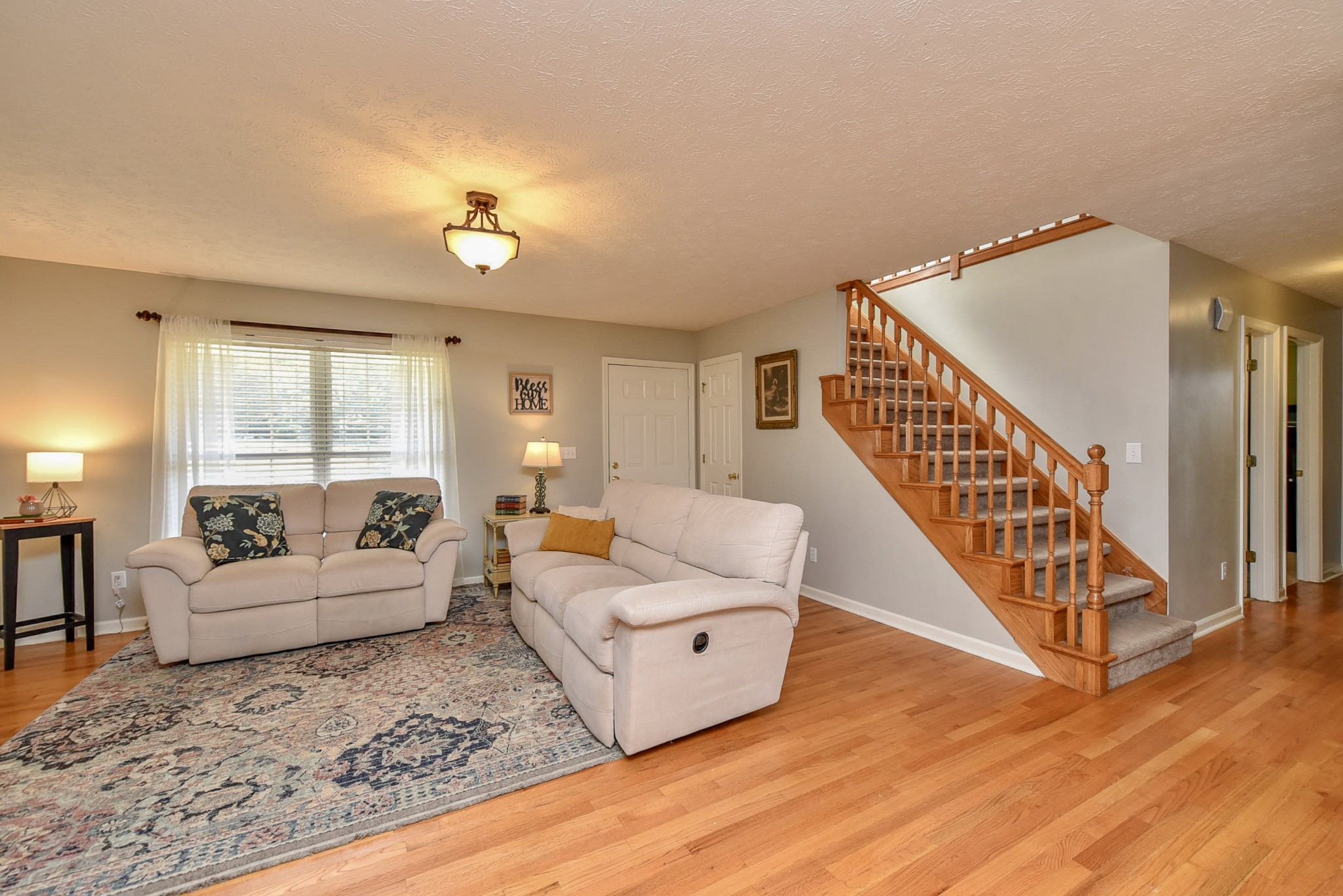 1059 North Corinth Road Portland, TN 37148 - Photo 13 of 40 a living room with furniture and wooden floor