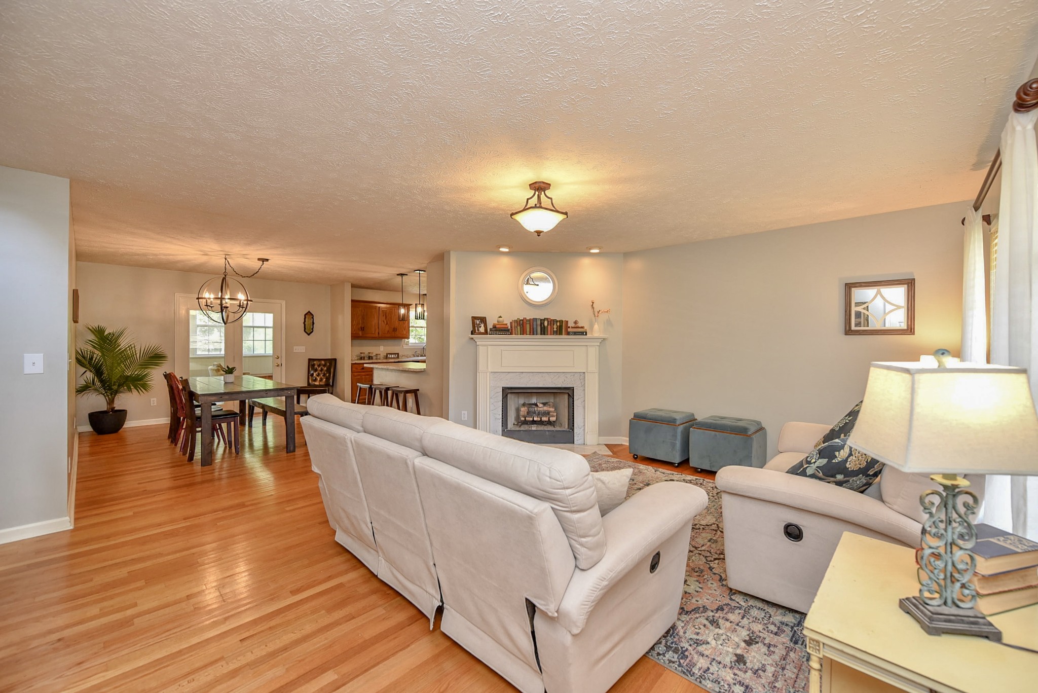 1059 North Corinth Road Portland, TN 37148 - Photo 15 of 40 a living room with furniture and a chandelier
