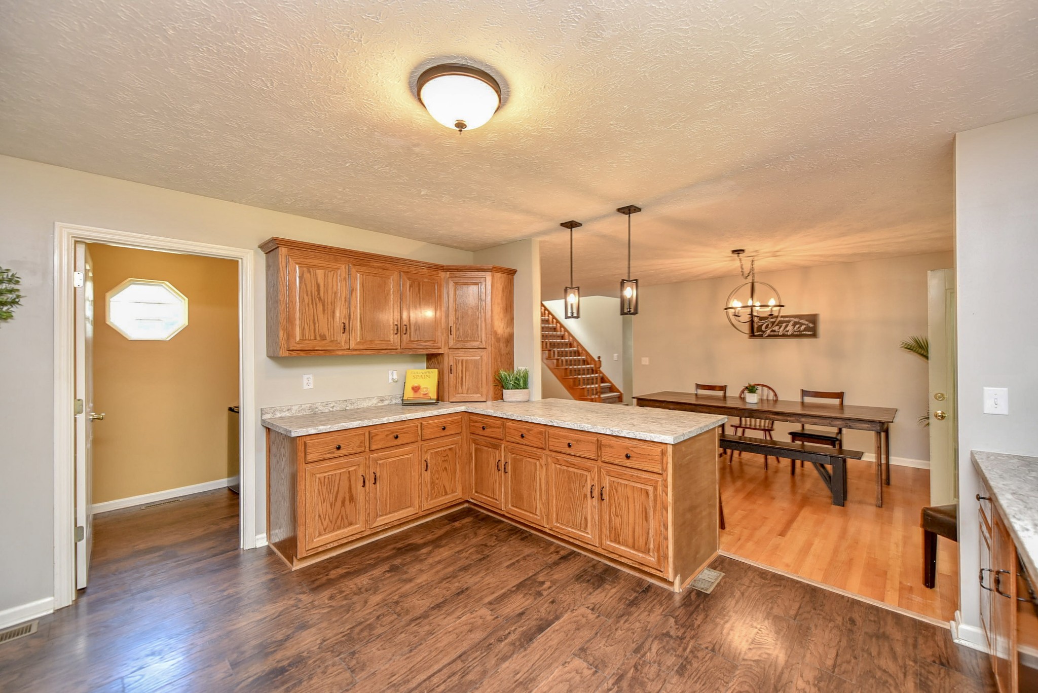 1059 North Corinth Road Portland, TN 37148 - Photo 20 of 40 a kitchen with a stove a sink and a refrigerator