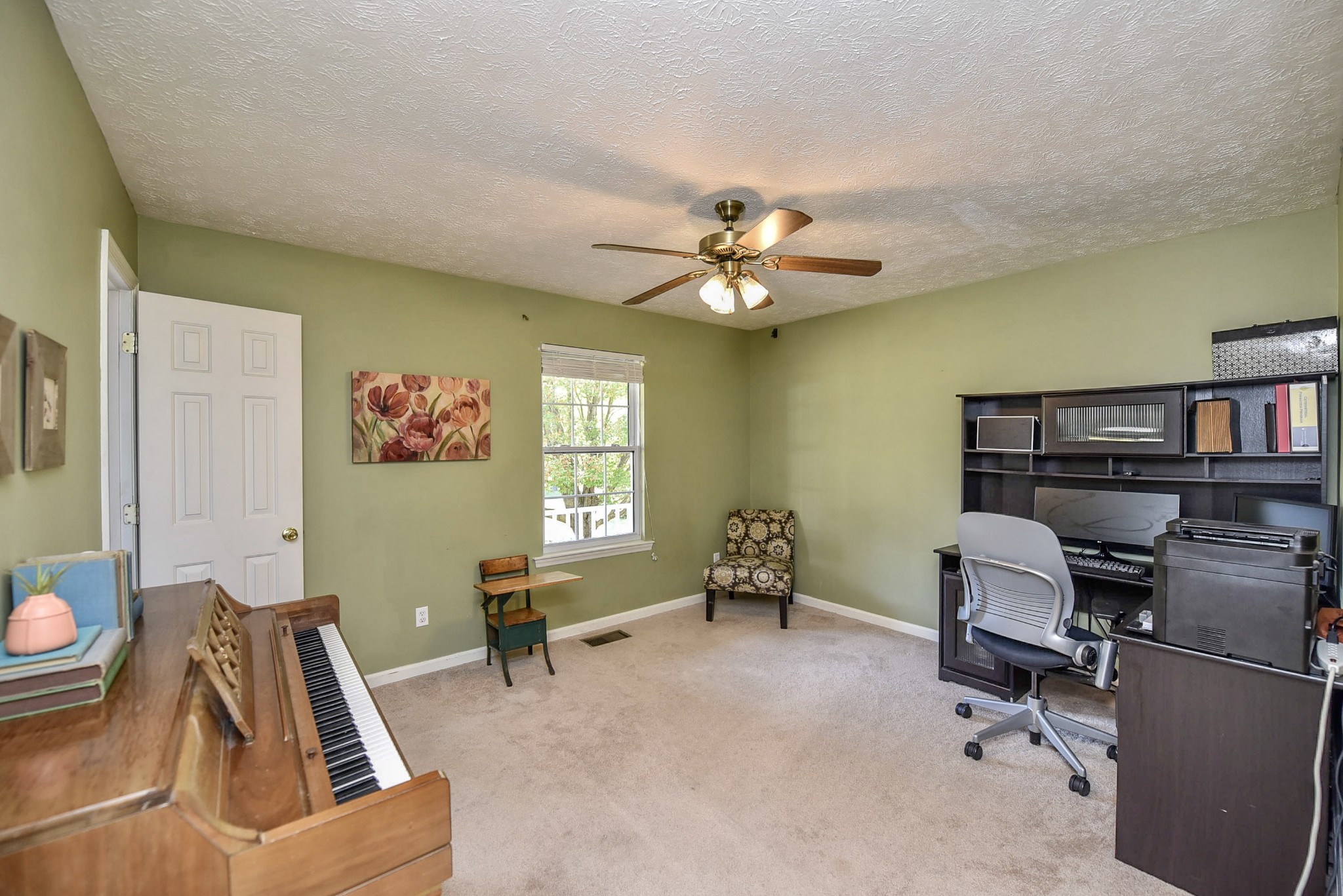 1059 North Corinth Road Portland, TN 37148 - Photo 25 of 40 a living room with furniture and a window