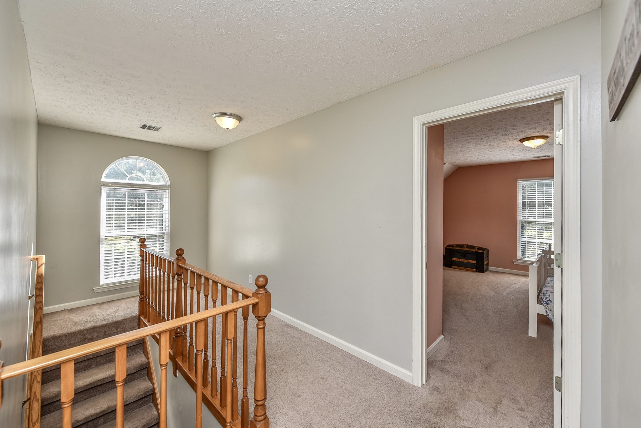 1059 North Corinth Road Portland, TN 37148 - Photo 28 of 40 a view of a hallway with wooden floor and stairs