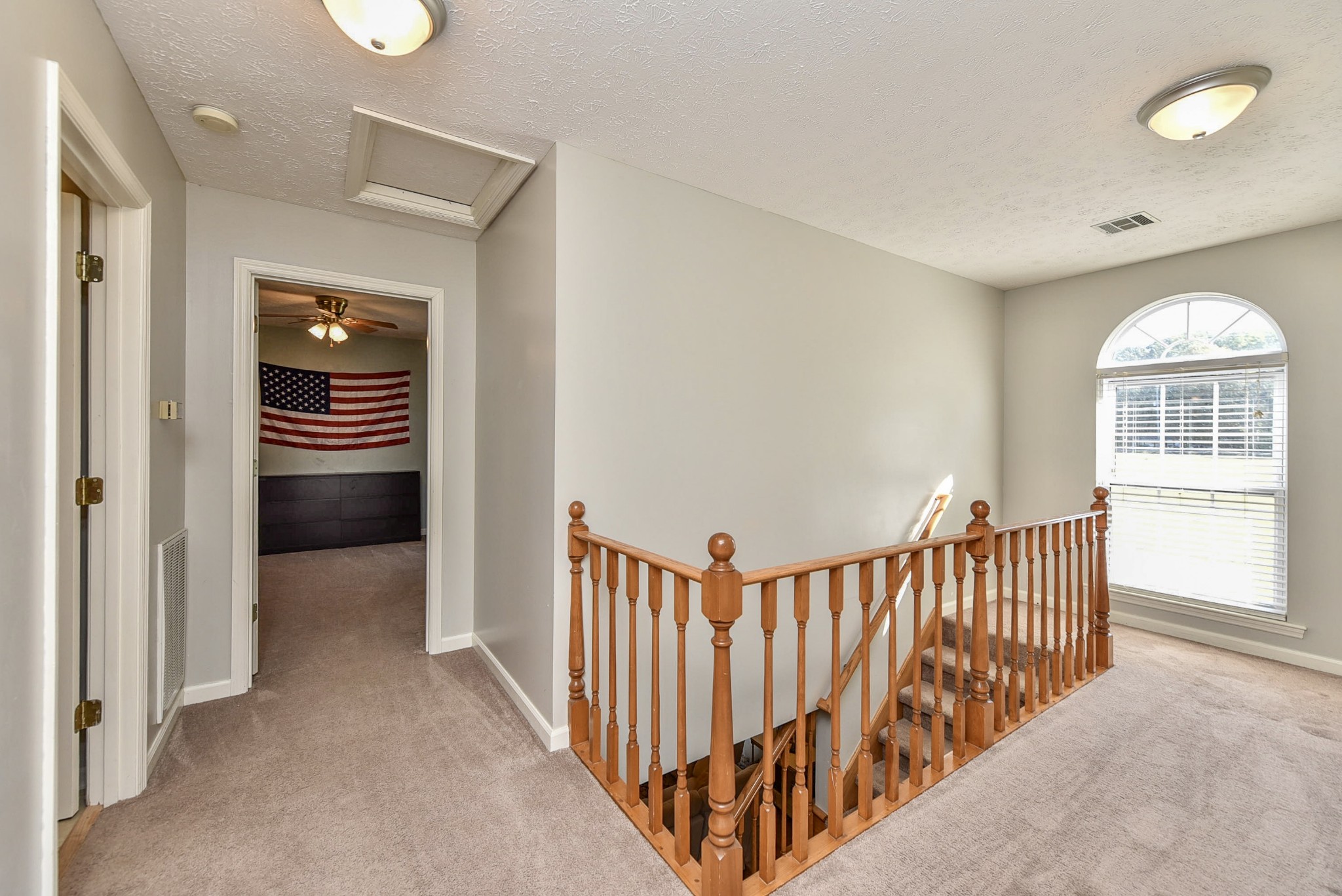 1059 North Corinth Road Portland, TN 37148 - Photo 32 of 40 a view of a hallway with windows and stairs