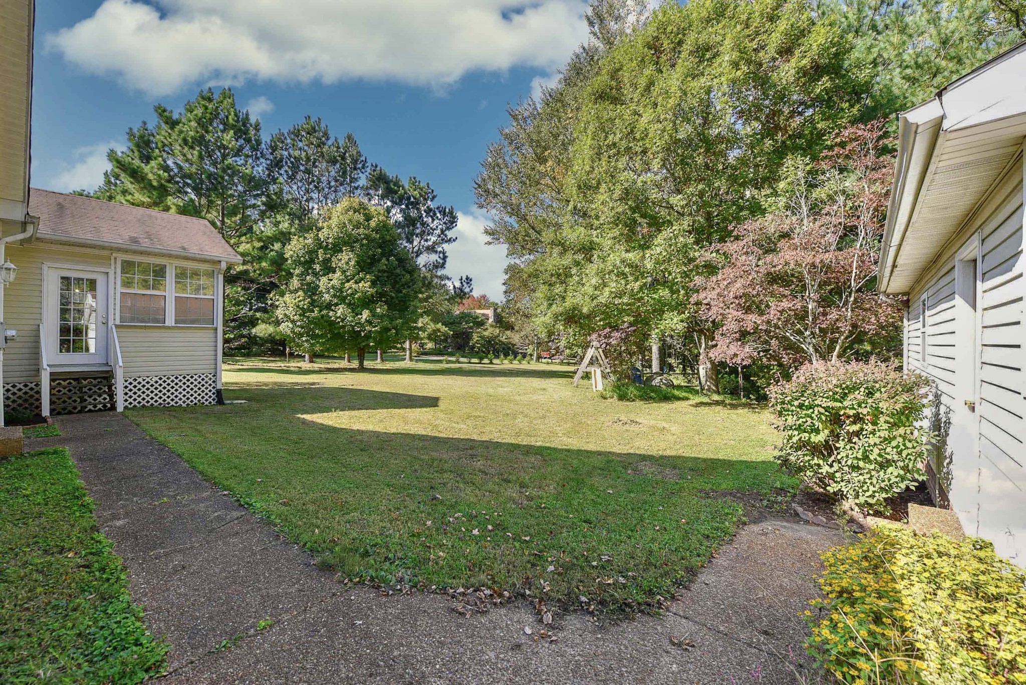 1059 North Corinth Road Portland, TN 37148 - Photo 38 of 40 a view of a house with a yard