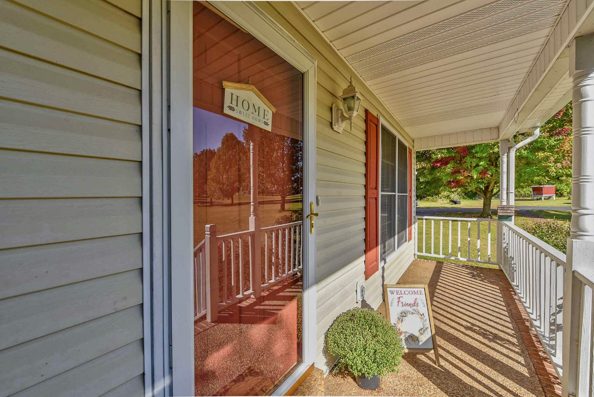1059 North Corinth Road Portland, TN 37148 - Photo 39 of 40 a view of a porch with wooden floor