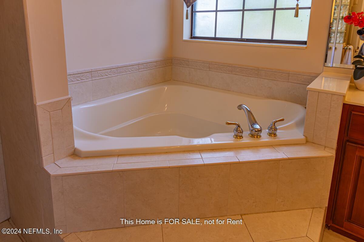 5745 Sheffield Road Jacksonville, FL 32226 - Photo 31 of 57 a bathroom with a sink