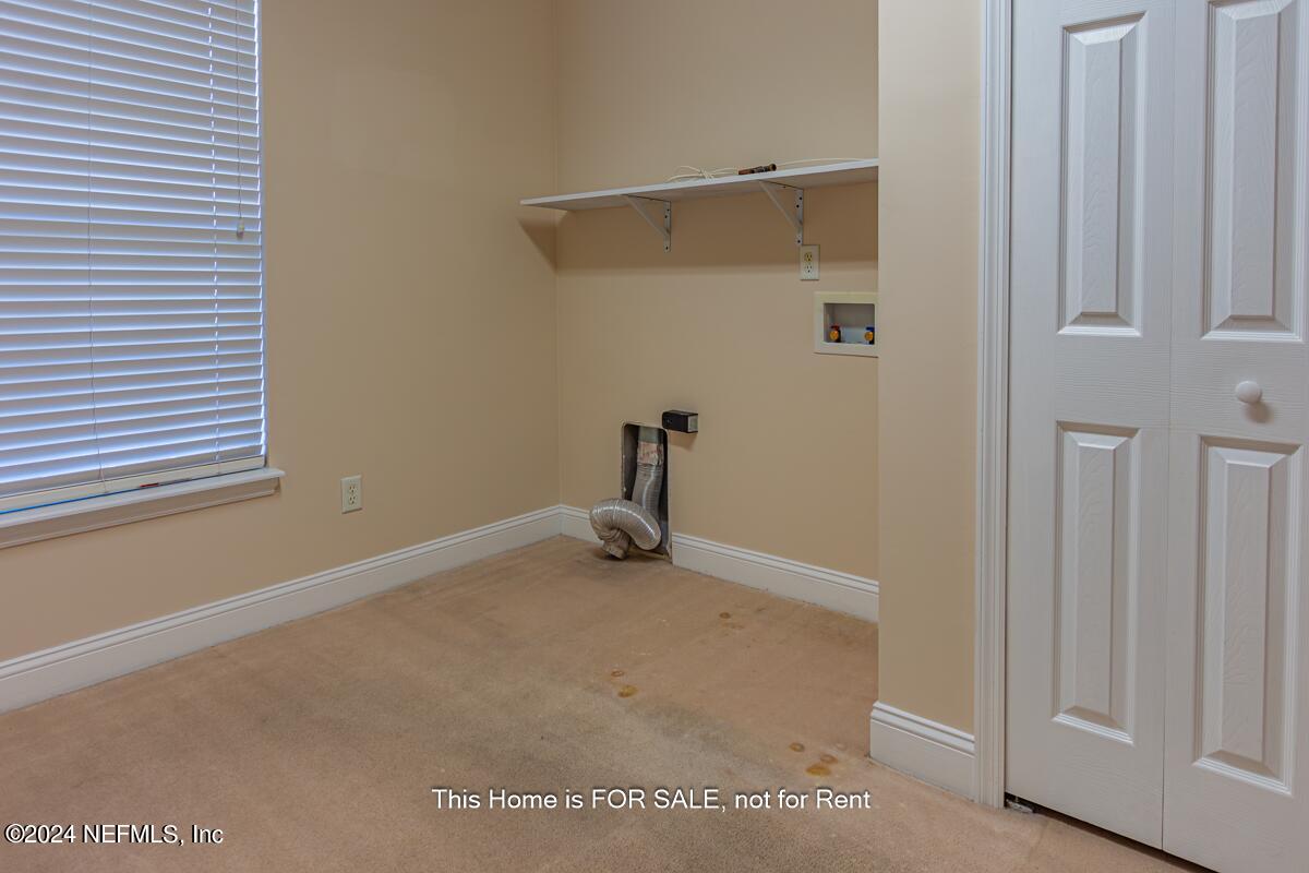 5745 Sheffield Road Jacksonville, FL 32226 - Photo 34 of 57 a view of empty room with wooden floor