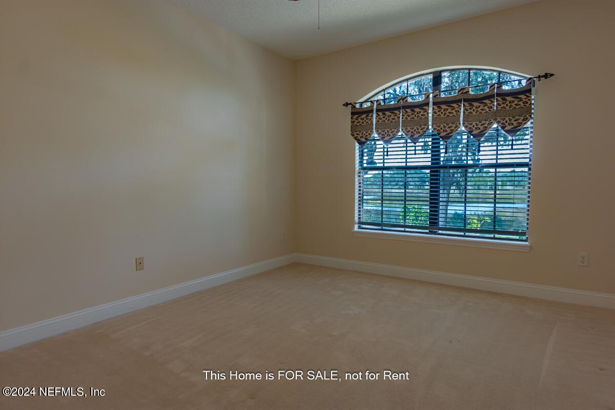5745 Sheffield Road Jacksonville, FL 32226 - Photo 35 of 57 an empty room with a window