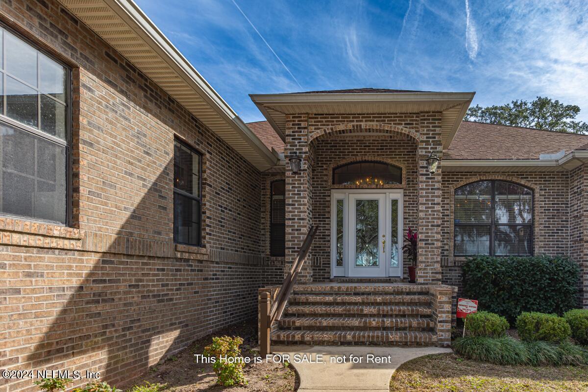 5745 Sheffield Road Jacksonville, FL 32226 - Photo 5 of 57 a view of a house with a balcony