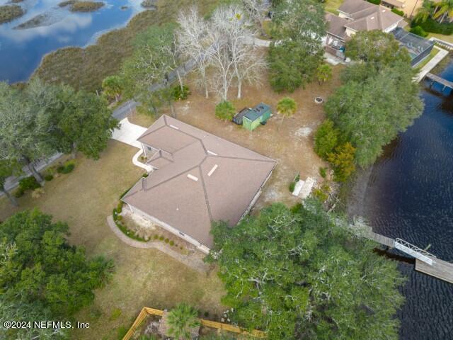 5745 Sheffield Road Jacksonville, FL 32226 - Photo 56 of 57 an aerial view of a house with a yard and a large tree