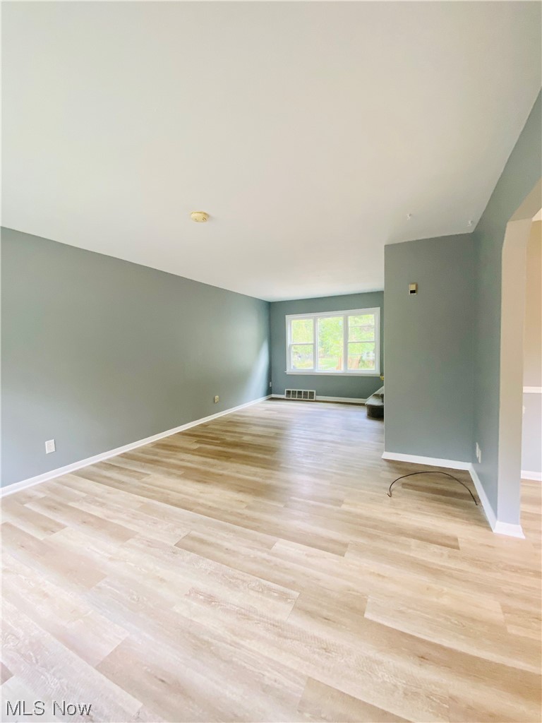 3683 Highland Road Cleveland, OH 44111 - Photo 5 of 17 Unfurnished room with light hardwood flooring