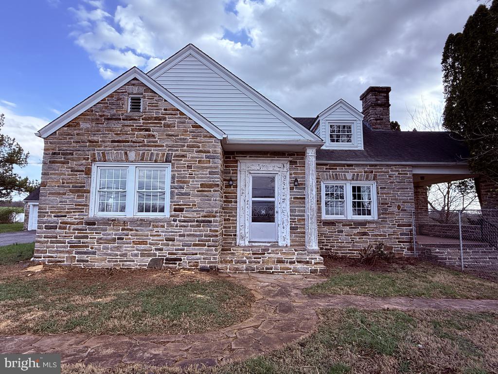 6245 Middleburg Road Keymar, MD 21757 - Photo 53 of 77 a front view of a house with garden