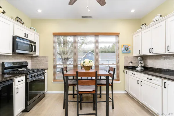 $479,990 | 654 Birchwood Park Drive, Middle Island, NY 11953