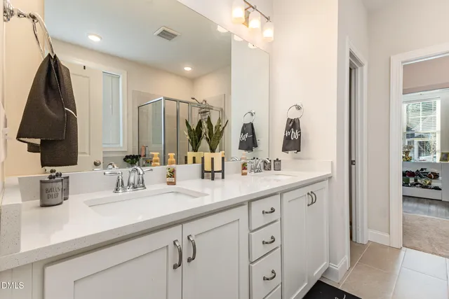 a front view of a house with a big yard