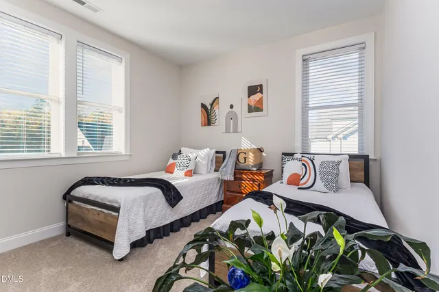 a living room with fireplace furniture and a flat screen tv