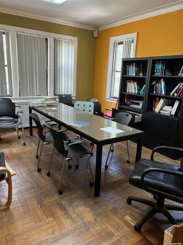 a view of a workspace with furniture