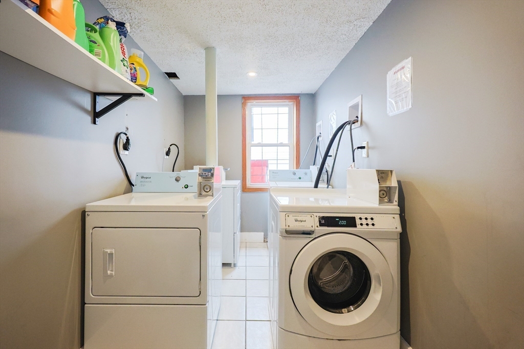 104 Oak Street Fall River, MA 02720 - Photo 26 of 37 a utility room with dryer and washer