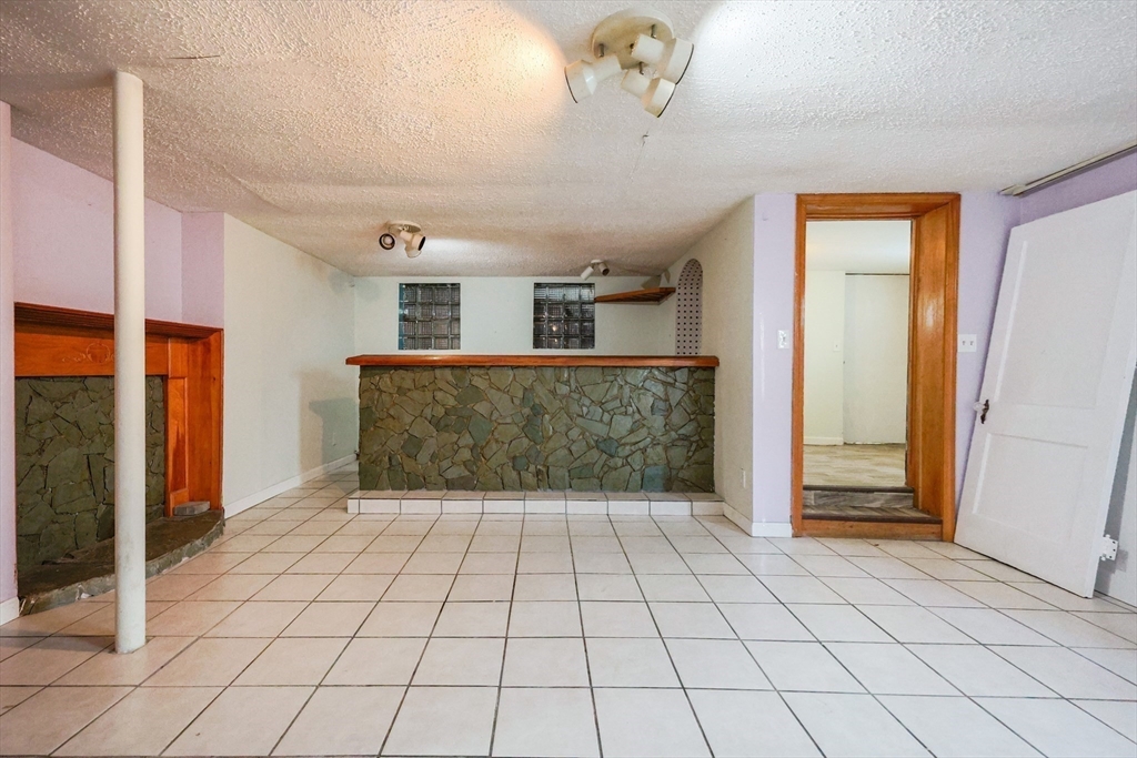 104 Oak Street Fall River, MA 02720 - Photo 29 of 37 a view of an empty room and window