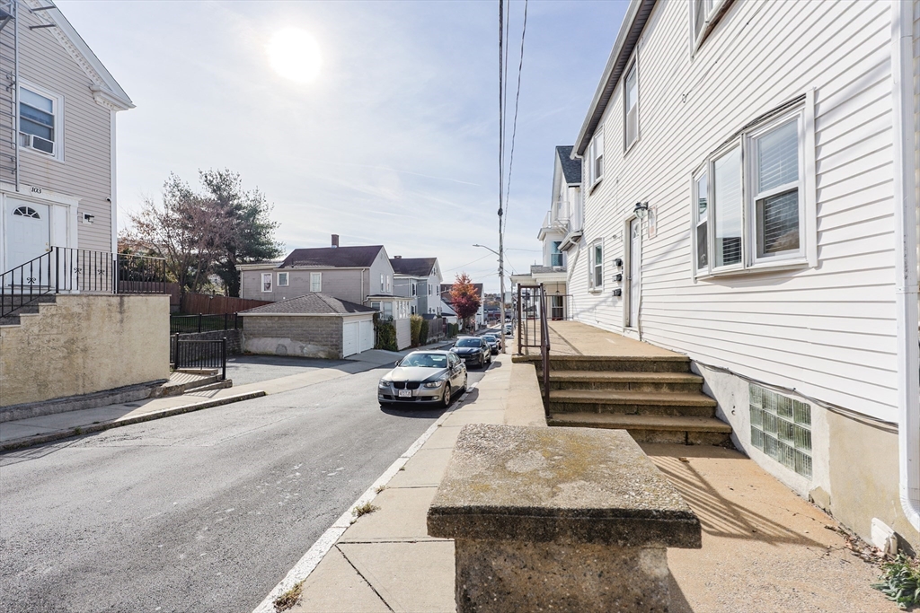 104 Oak Street Fall River, MA 02720 - Photo 4 of 37 a view of a patio with couches and potted plants