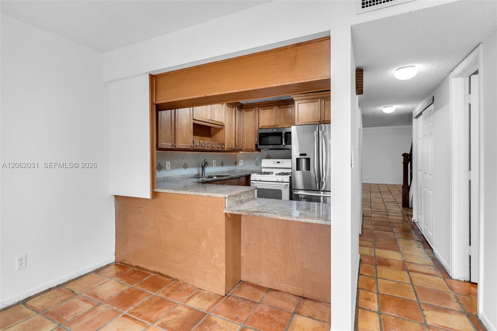 11411 Southwest 109th Road, Unit 50Y Miami, FL 33176 - Photo 12 of 40 Kitchen