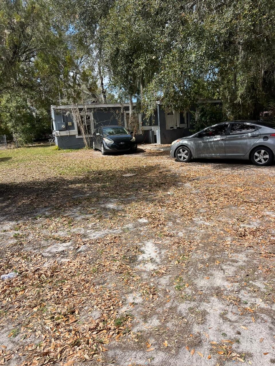 5846 Abelia Road Jacksonville, FL 32209 - Photo 8 of 15 a view of street with parked cars